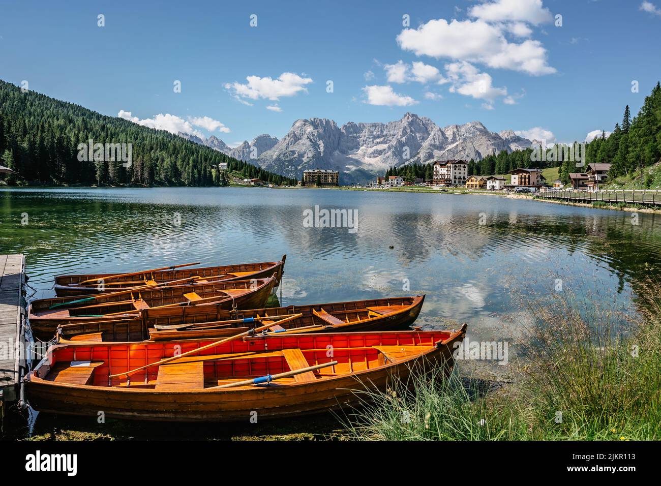 Lake Misurina,Lago di Misurina is pearl of the Dolomites.Mountain lake in Italy with wooden boats,Veneto region,Sorapis mountain group.Perfect Stock Photo