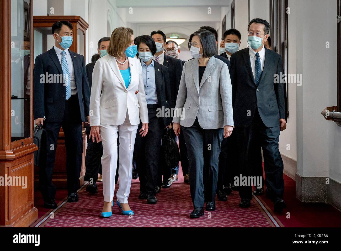 Taipei, Republic of, China. 03rd Aug, 2022. Taiwan President Tsai Ing-wen, right, escorts U.S. Speaker of the House Nancy Pelosi, and delegates prior to their meetings at the presidential office, August 3, 2022 in Taipei, Taiwan. Pelosi is leading a delegation of congressional leaders in a visit that has angered China. Credit: Makoto Lin/Taiwan Presidential Office/Alamy Live News Stock Photo