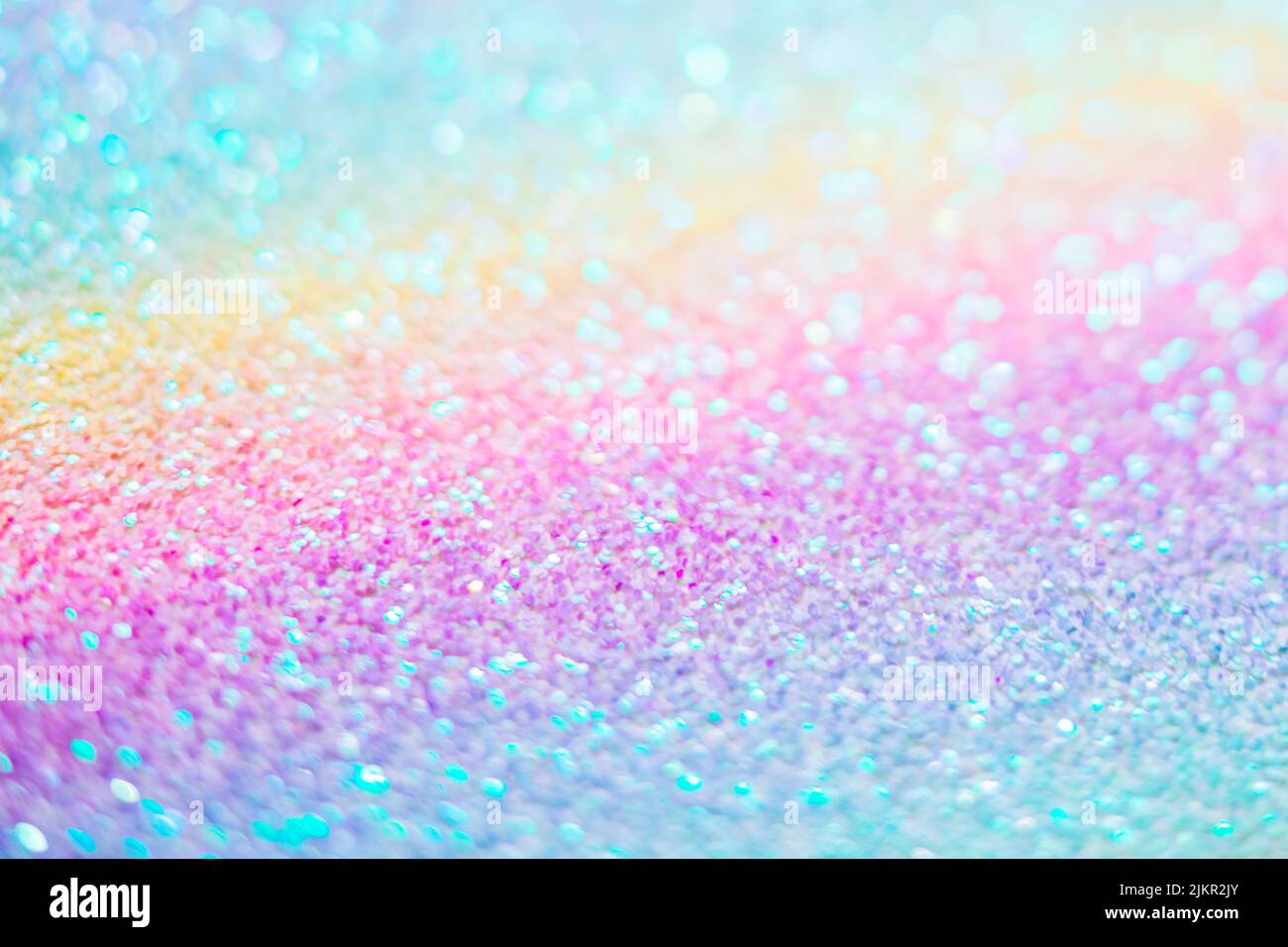 Sparkling with rainbow lights unicorn glitter texture Stock Photo