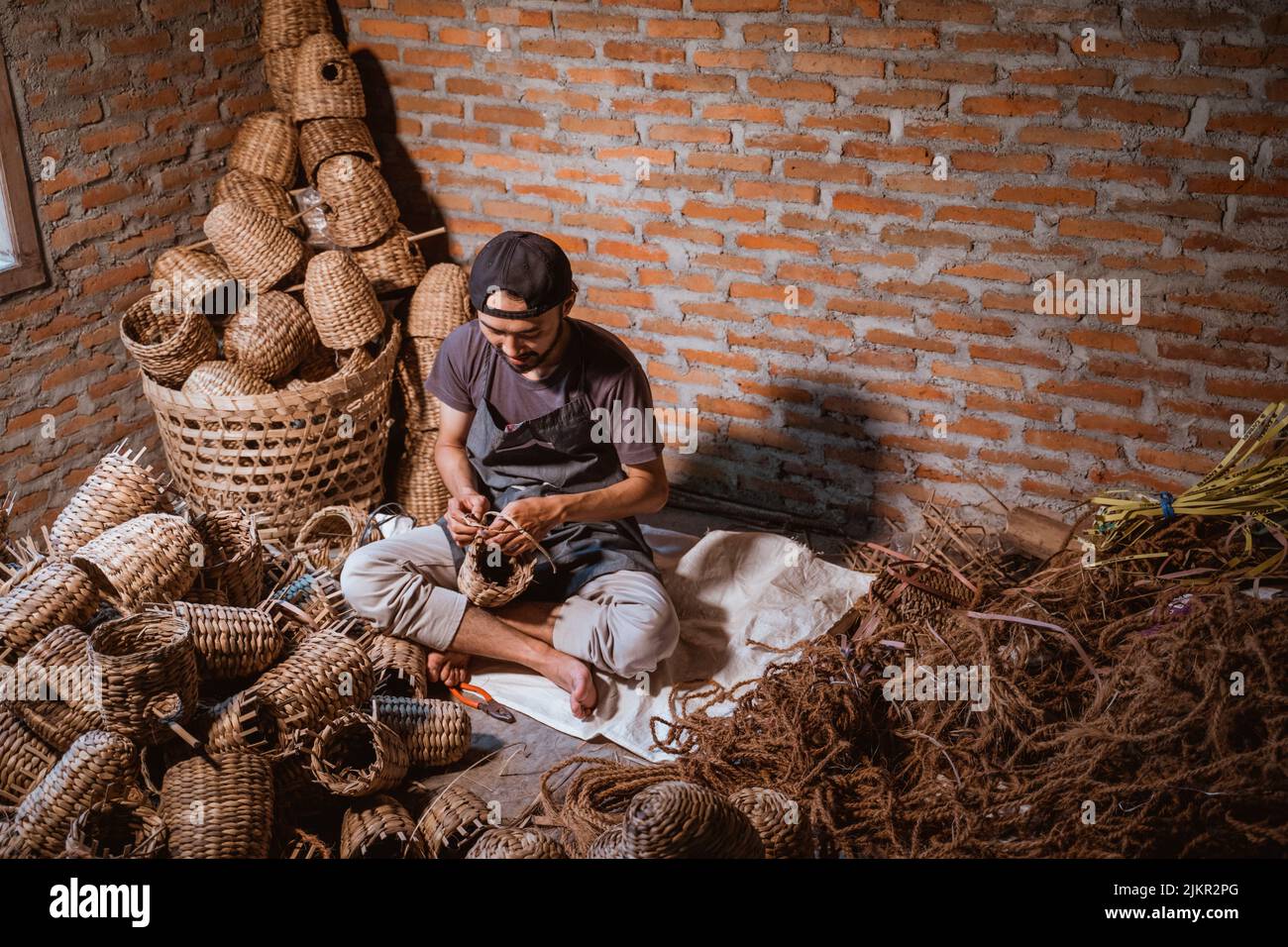 Top view of water hyacinth craftsman making baskets Stock Photo Alamy