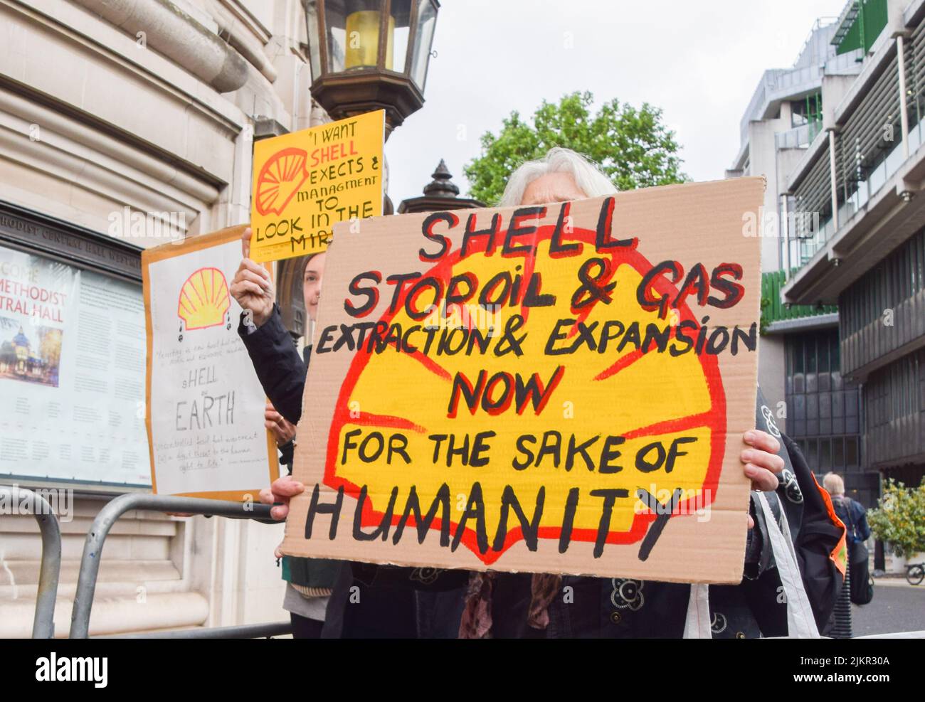 London, UK. 24th May 2022. Climate activists disrupted oil giant Shell's Annual General Meeting at Methodist Central Hall in Westminster. Protesters gathered outside while several dozean activists disrupted the meeting inside the venue. Stock Photo