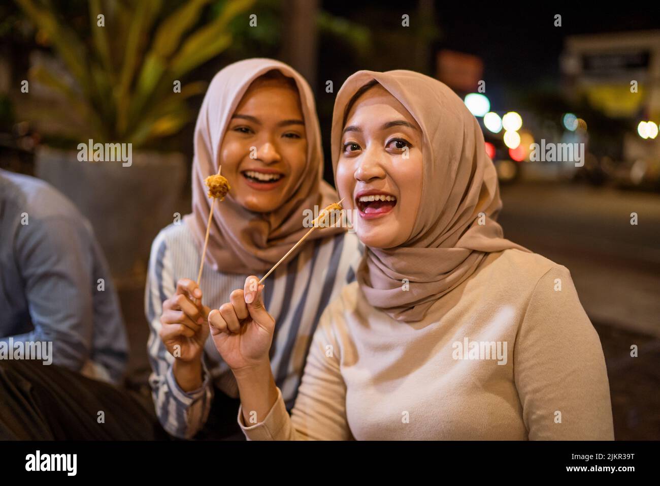 Friend Eating Satay Break Fasting In Traditional Food Stall Stock Photo 