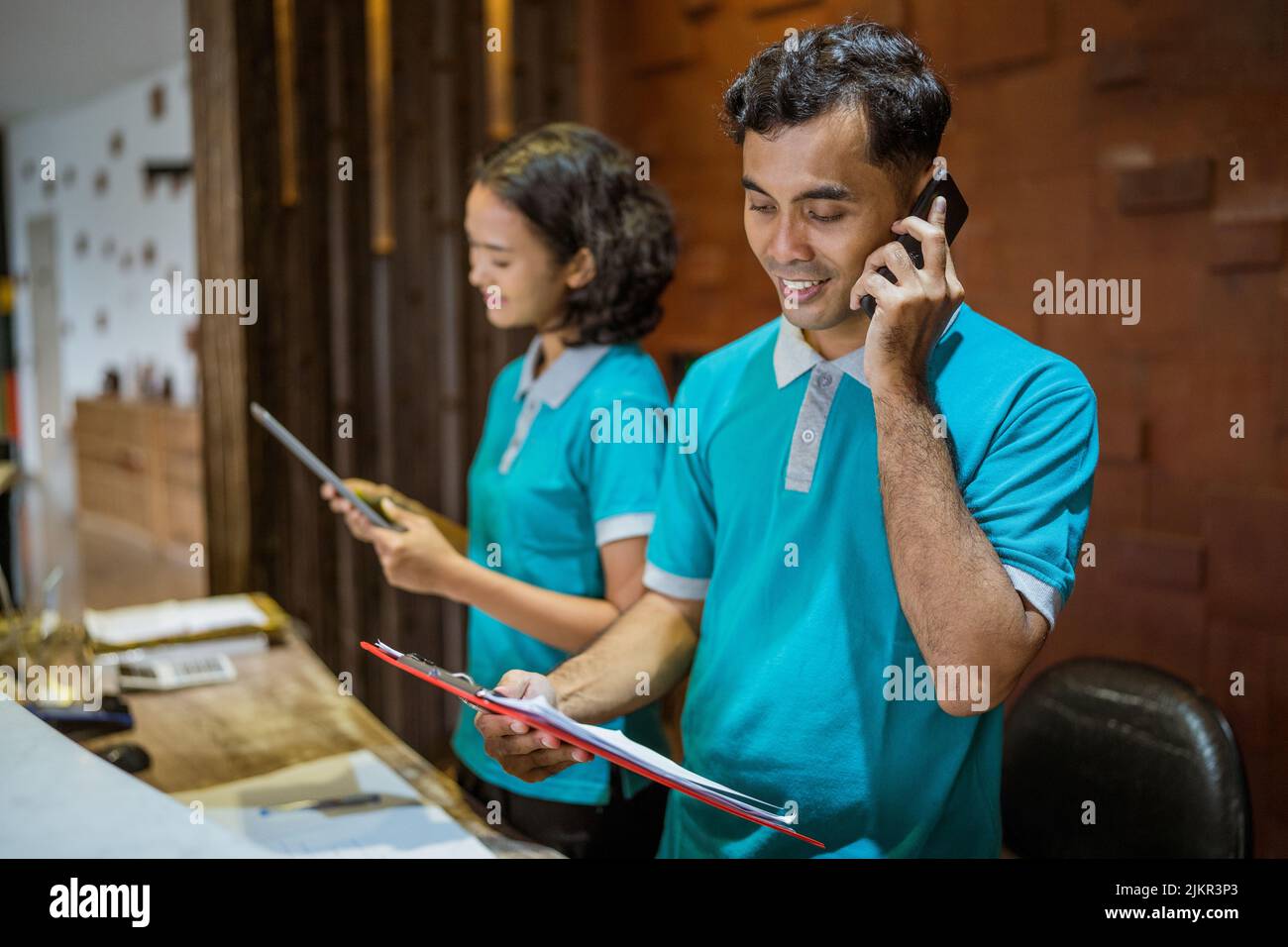 Receptionist Notes Male receptionist notes hi-res stock photography and images - Alamy