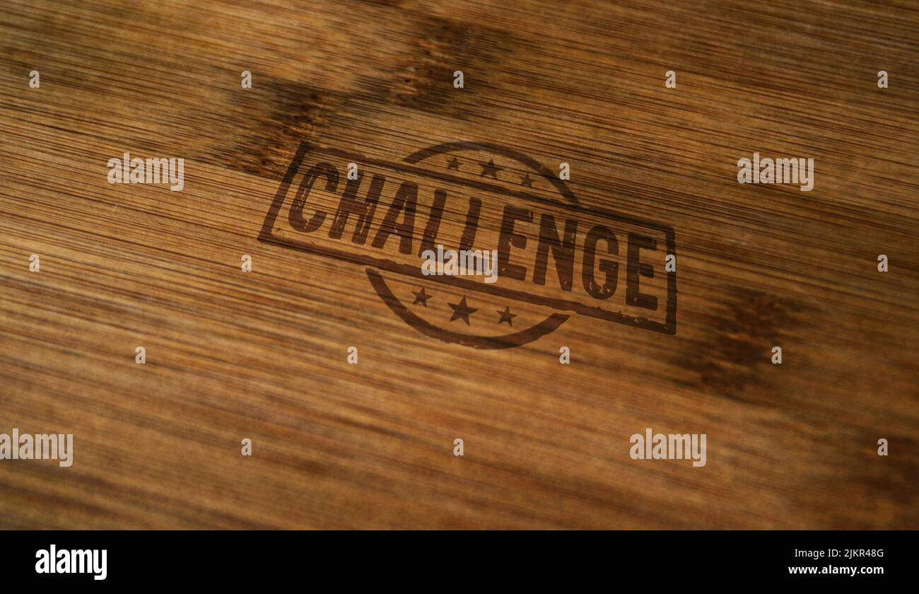 Challenge stamp printed on wooden box. Goal achieving, competition and motivation concept. Stock Photo