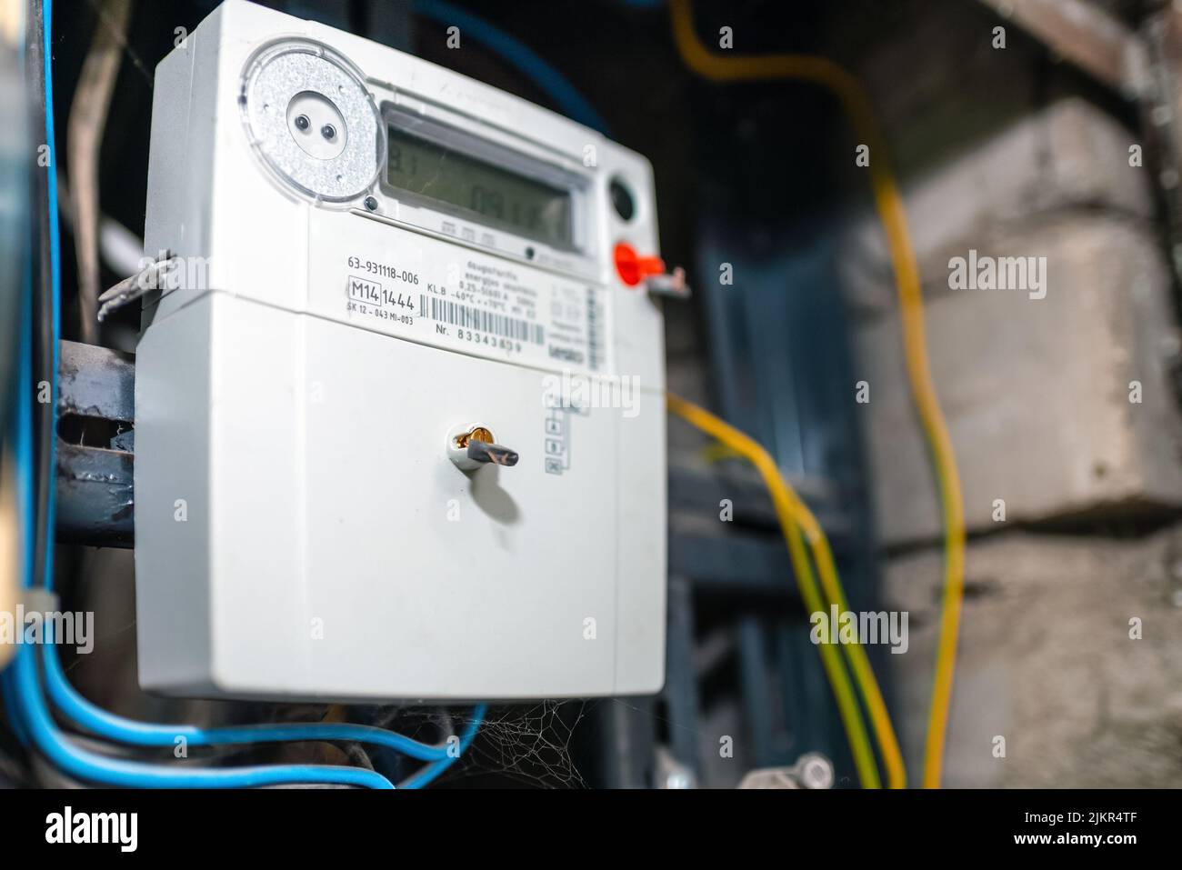 Smart electric power meter counter measuring power usage.Close-up of modern smart grid residential digital power supply meter.Indoors shot.Selective f Stock Photo