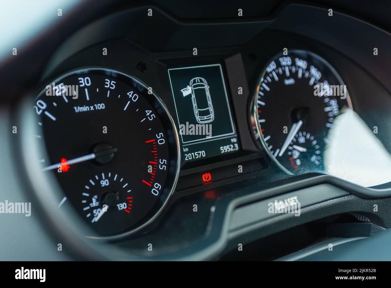 Modern car speedometer,odometer,tachometer and illuminated dashboard