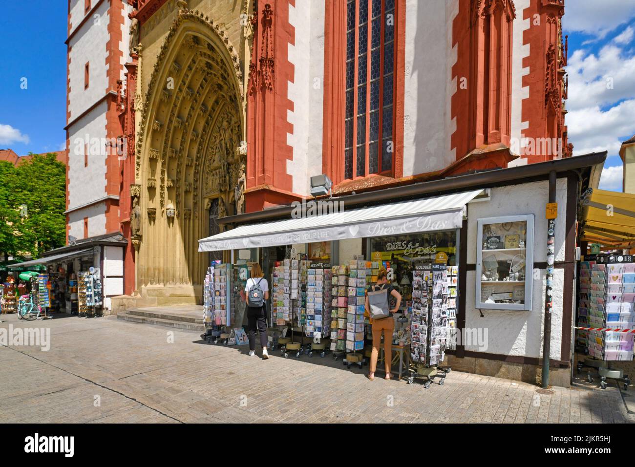 Würzburg, Germany - July 2022: Tourist souvenir shop at 'Marienkapelle' church located at market square Stock Photo