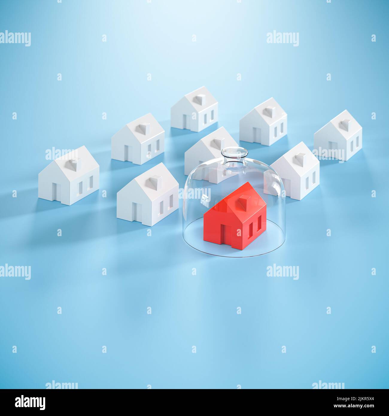 Proptecting your property concept - insurance, surveillance. Several model houses, one in red with a glass dome. Stock Photo