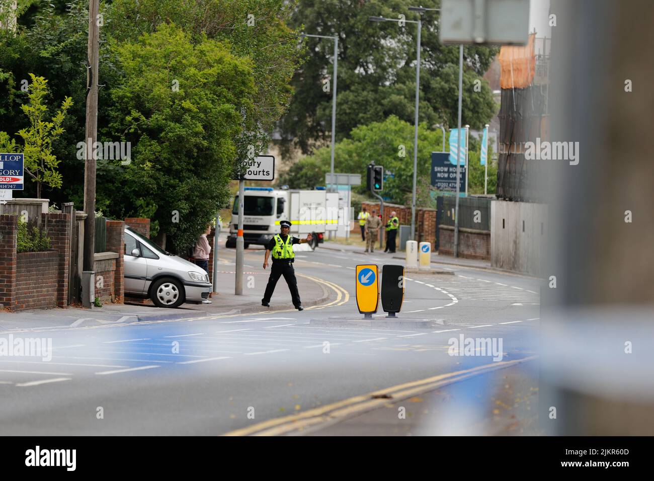 Salisbury, Wiltshire, UK. 3rd August 2022. Bomb disposal experts on the scene of a bomb scare outside Salisbury Law Courts, Wilton Road.   Credit: Simon Ward/Alamy Live News Stock Photo
