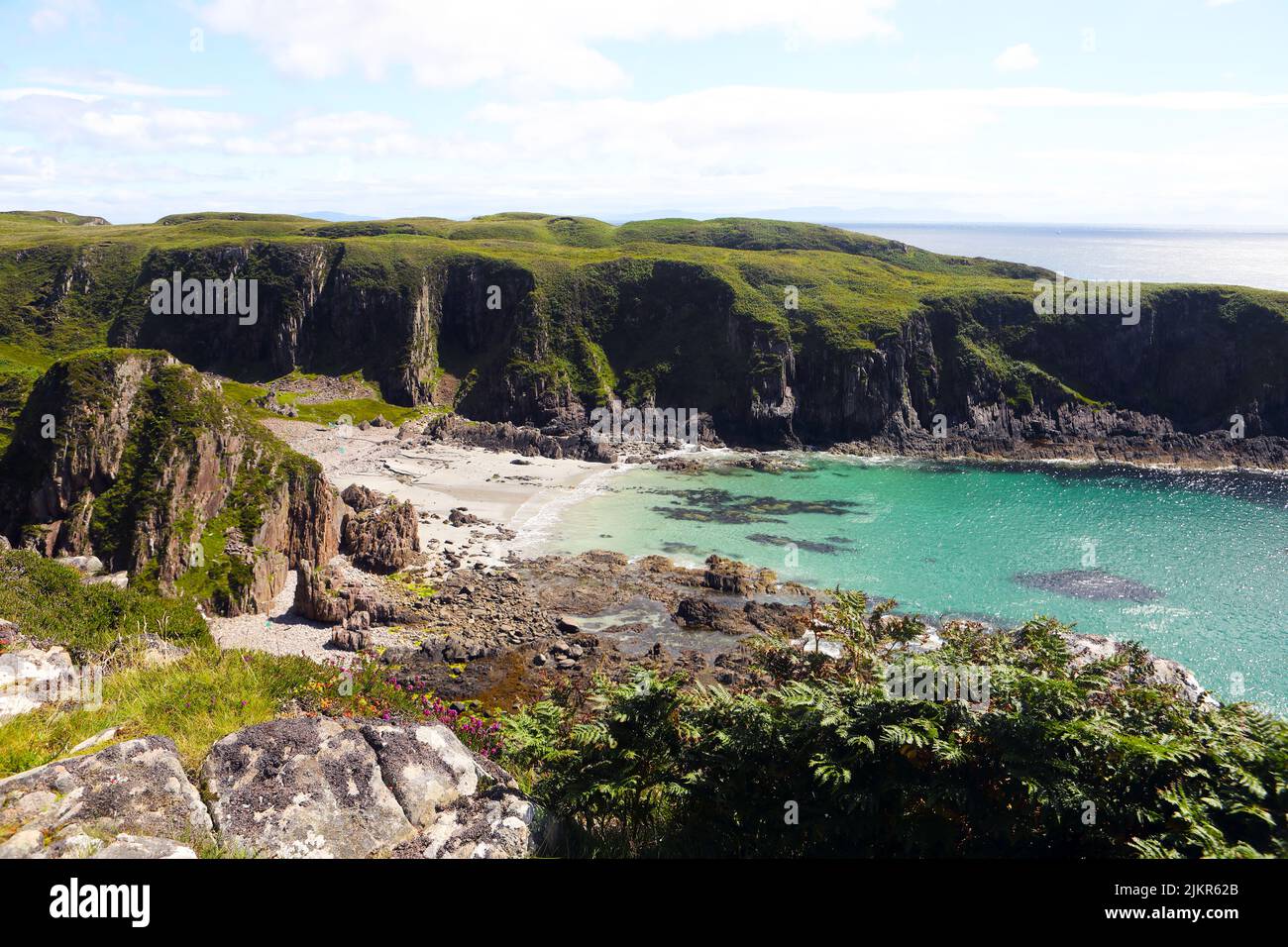 Out of the way sandy coves and rugged coastline of the Isle of Mull in the Inner Hebrides of Scotland Stock Photo