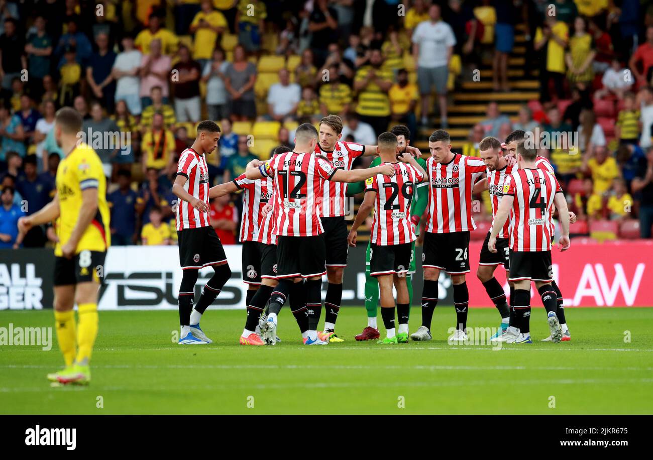 Watford, England, 1st August 2022.   The first team huddle of the season during the Sky Bet Championship match at Vicarage Road, Watford. Picture credit should read: Simon Bellis / Sportimage Stock Photo
