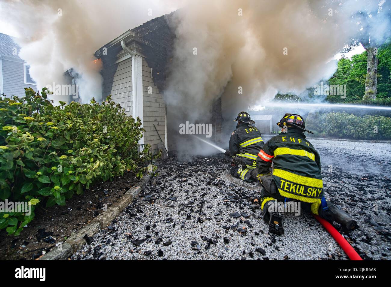 The East Hampton Fire Department was dispatched to 11 Roberts Lane at 6:34 p.m. on Sunday, June 7th, 2020 for a reported working structure fire in a g Stock Photo