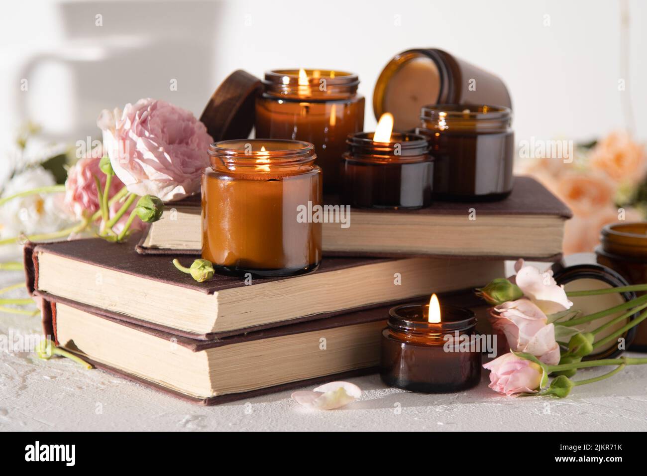 A set of different aroma candles in brown glass jars. Scented handmade