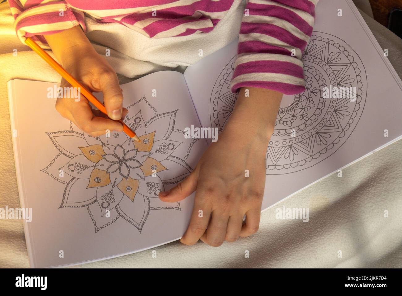 Woman coloring antistress page. Female hand painting mandala. Female ...