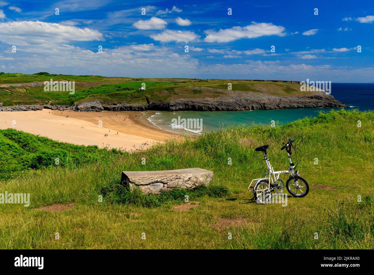 A modern, stylish DiBlasi Italian folding bike above Broadhaven beach, Pembrokeshire, Wales, UK Stock Photo