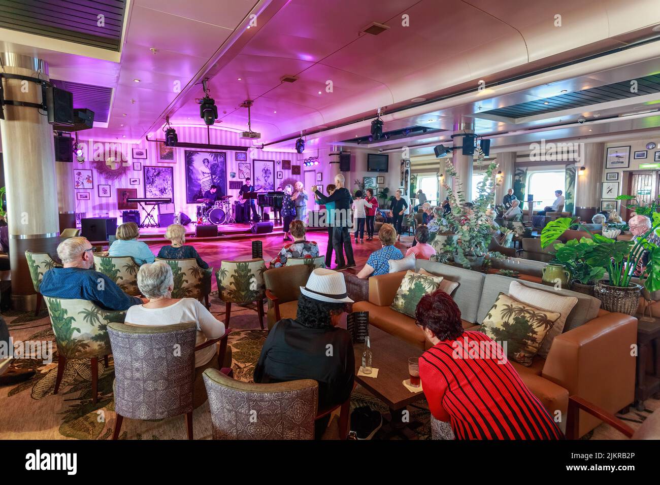 Passengers dancing to live music in a cruise ship's lounge. Photographed on board the P&O liner 'Pacific Jewel' Stock Photo
