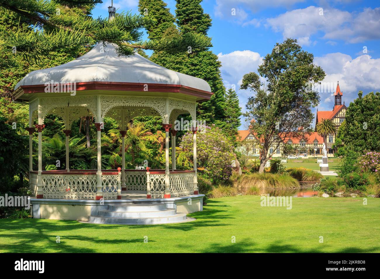 Government Gardens park in Rotorua, New Zealand. In the foreground is a historic band rotunda, with the iconic Rotorua Museum behind Stock Photo