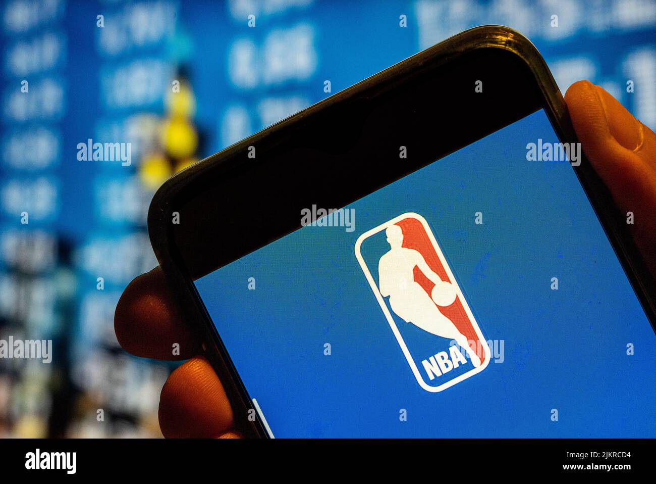 In this photo illustration, the American National Basketball Association (NBA) men's professional basketball league logo is displayed on a smartphone screen. (Photo by Budrul Chukrut / SOPA Images/Sipa USA) Stock Photo