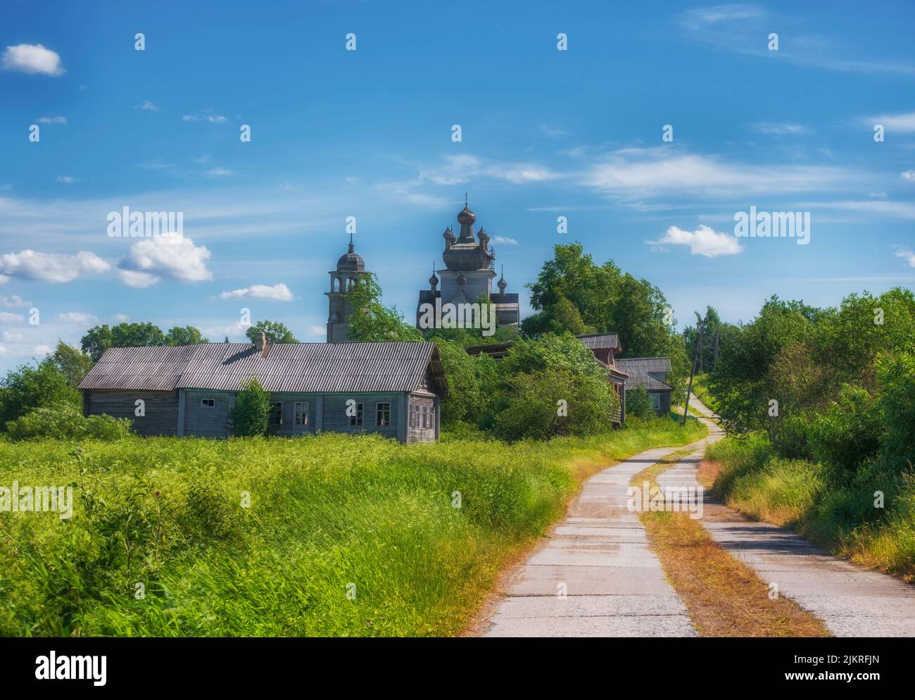 Arkhangelsk region, village of Turchasovo near the Onega River. the old wooden Church of the Transfiguration of 1786 and the bell tower of 1793. rural Stock Photo