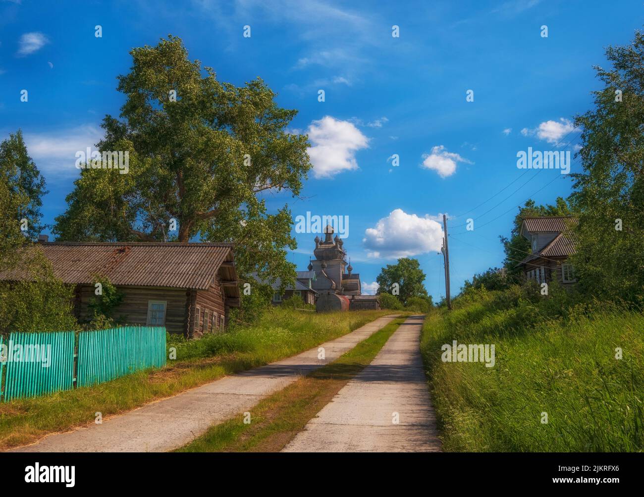 Arkhangelsk region, the village of Turchasovo near Onega River. the old wooden Church of the Transfiguration of 1786 and the bell tower of 1793. Stock Photo