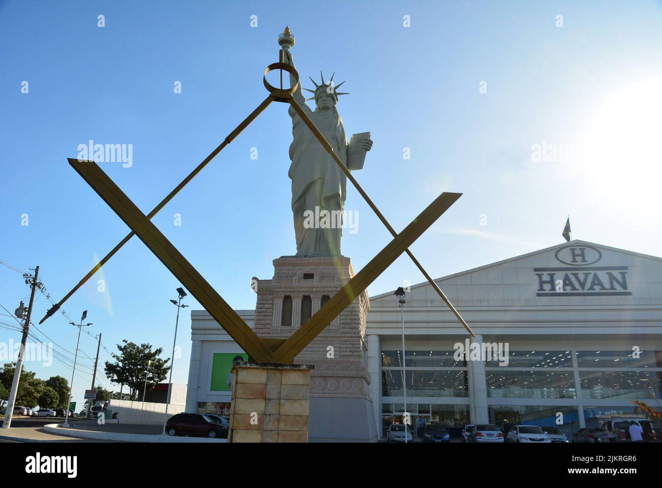 Landmark commemorating the masonic lodge in the foreground and imitation of the Statue of Liberty, on a concrete plinth, dusk, Brazil, South America, Stock Photo