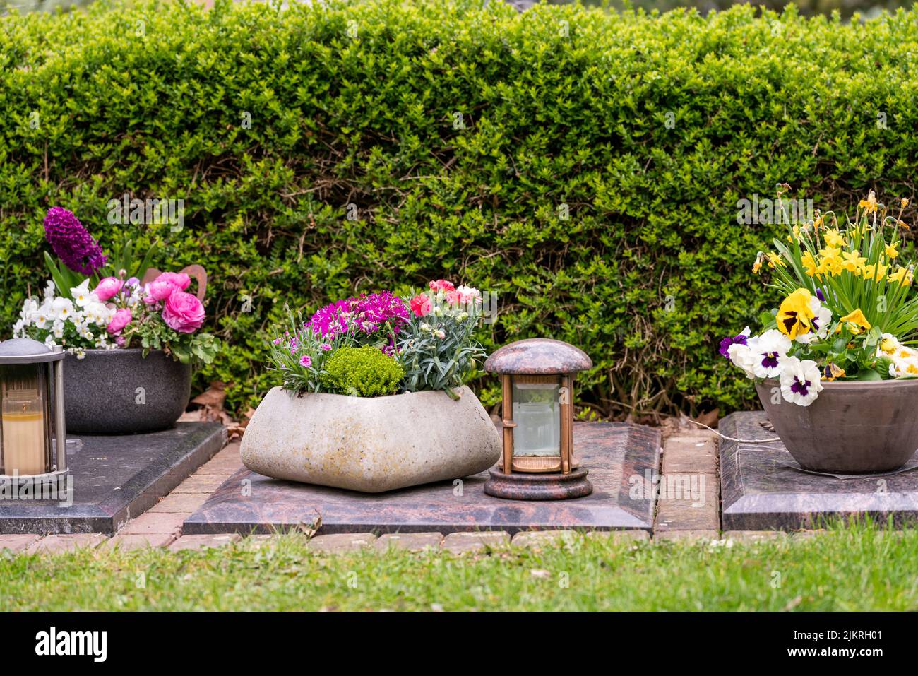 Candles on graves symbolize the memory of the dead on November 1 Stock