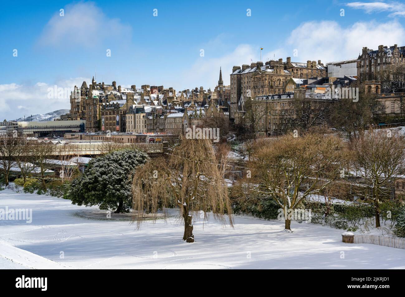 View across East Princes Street Gardens with a covering of snow to the Old Town in Edinburgh, Scotland UK Stock Photo