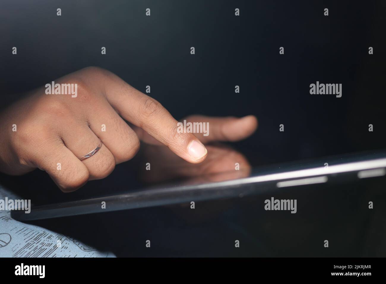 man hand using digital tablet on black background  Stock Photo