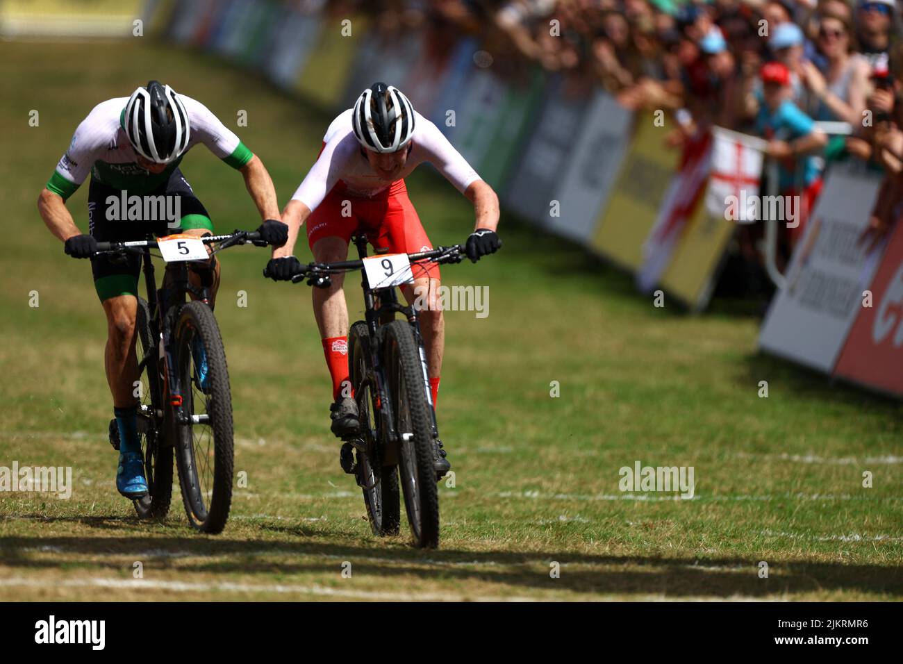Commonwealth Games - Mountain Bike - Men's Cross-country - Final - Birches Valley, Rugeley, Birmingham, Britain - August 3, 2022 Northern Ireland's Cameron Orr and England's Jospeh Blackmore in action REUTERS/Hannah Mckay Stock Photo