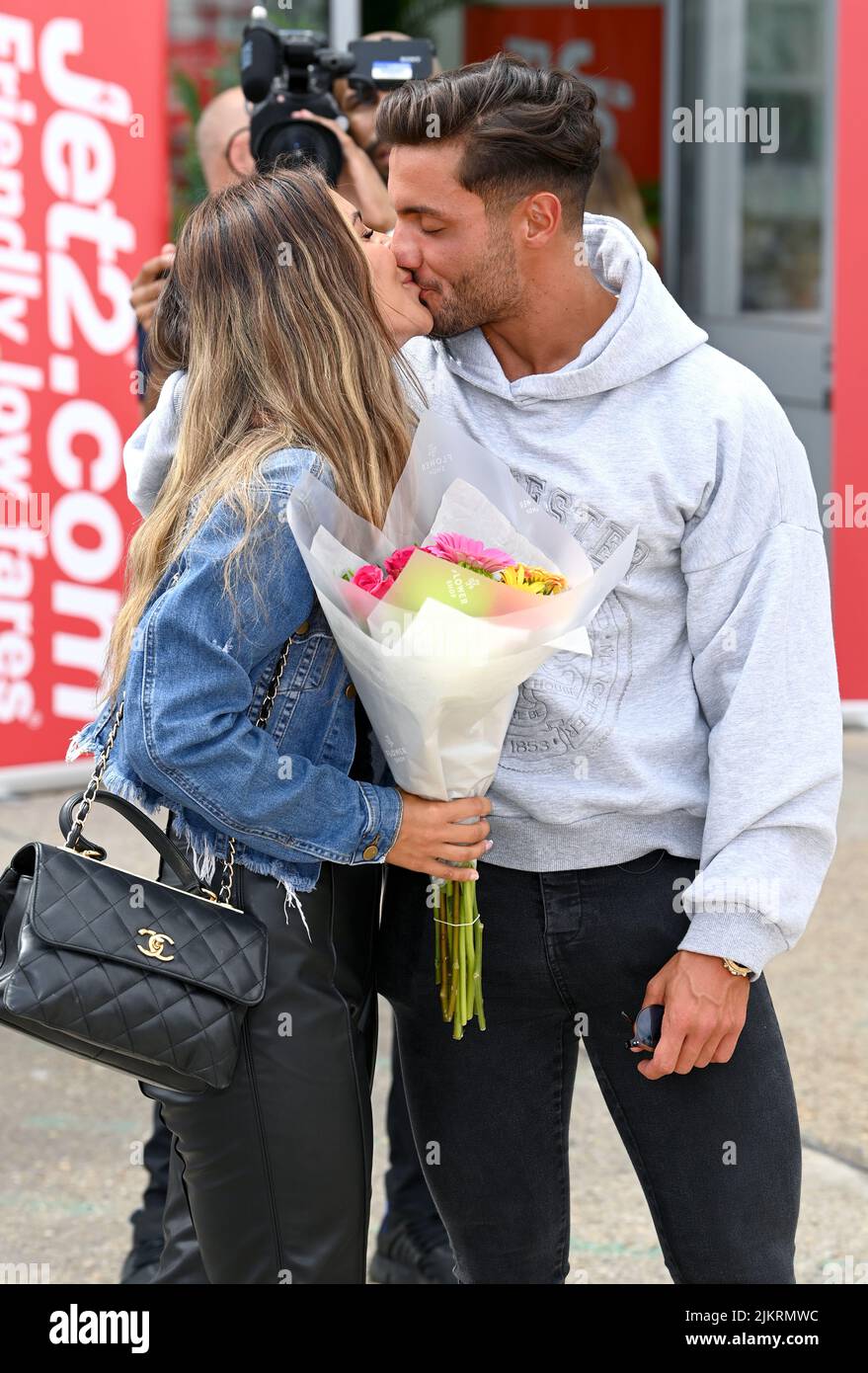 Stansted, UK. 03rd Aug, 2022. London, UK. August 3rd, 2022. London, UK. Ekin-Su Culculoglu and Davide Sanclimenti, winners of Love Island 2022 arriving at Stansted Airport. Credit: Doug Peters/Alamy Live News Stock Photo