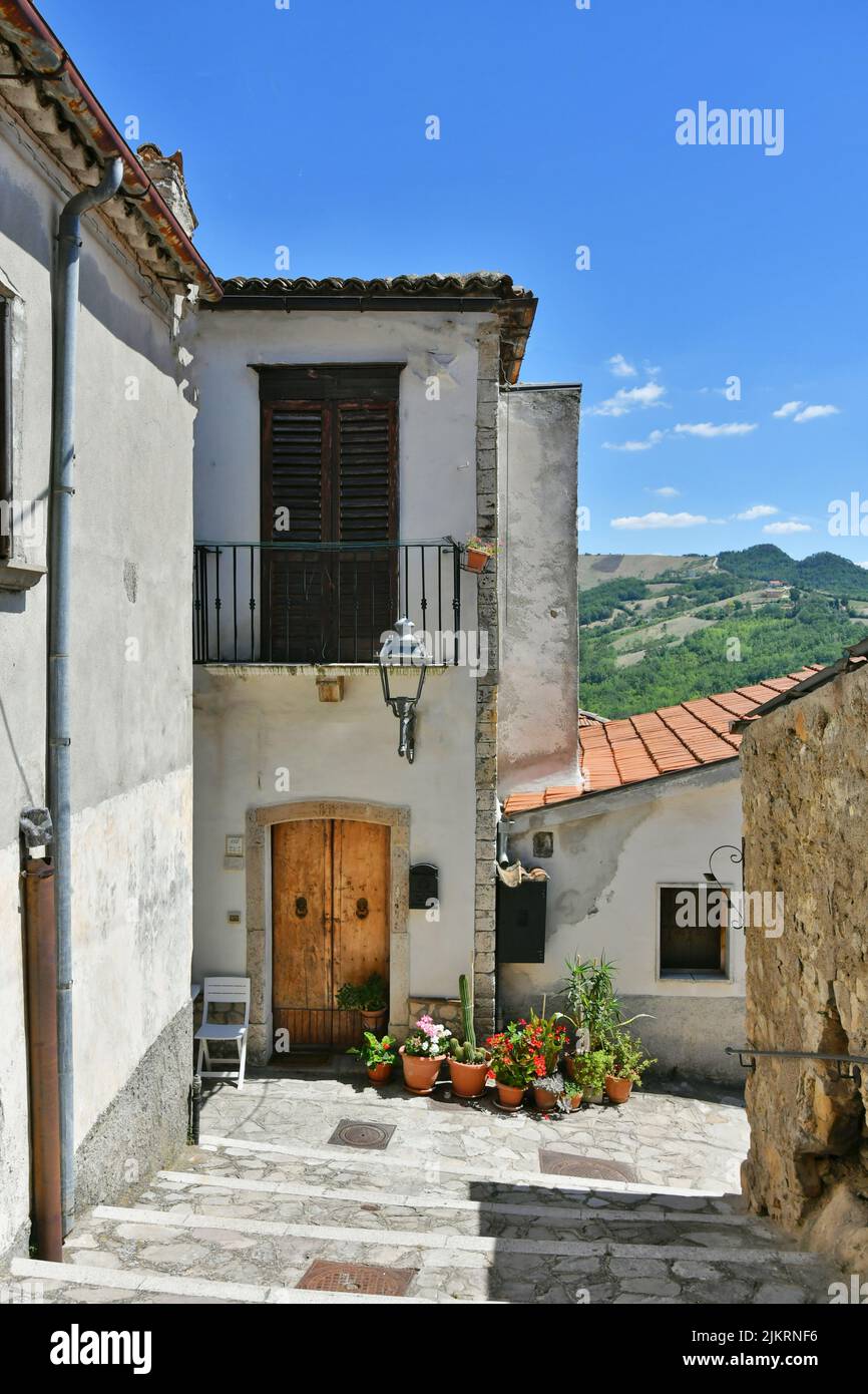 A small street between the old houses of Zungoli, one of the most