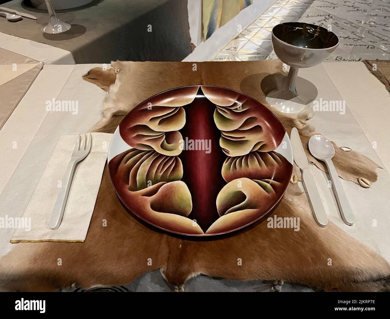 Judy Chicago, 'The Dinner Party,' Brooklyn Museum, 'Primordial Goddess' plate and setting. Stock Photo