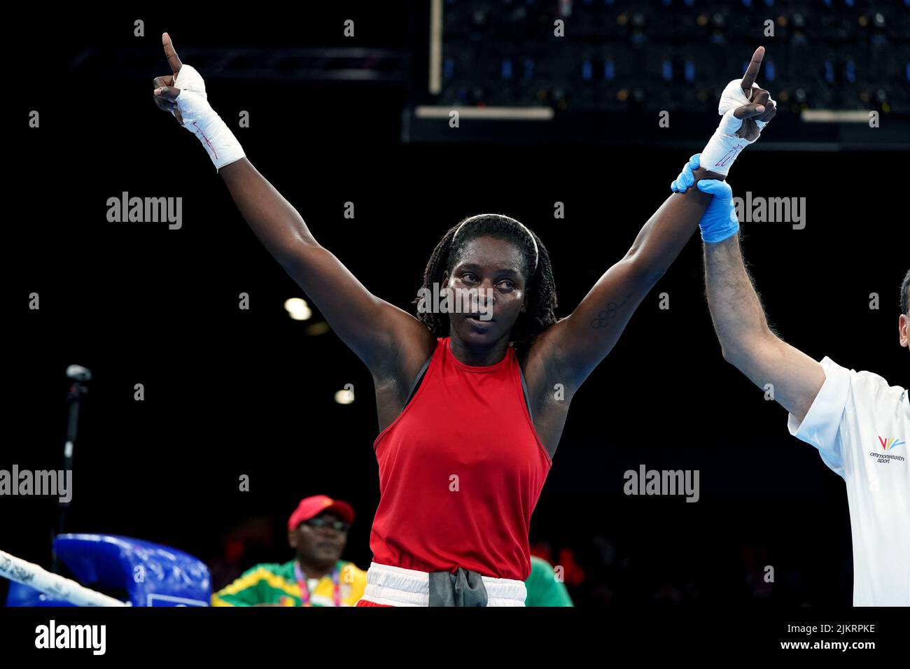 Mozambique's Alcinda Helena Panguana celebrates victory over Cameroon's Clotilde Essiane following the Women's Over 66kg-70kg (Light Middle) - Quarter-Final 1 at The NEC on day six of the 2022 Commonwealth Games in Birmingham. Picture date: Wednesday August 3, 2022. Stock Photo