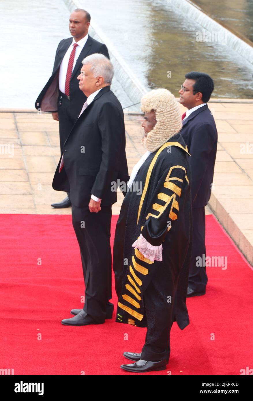 (220803) -- COLOMBO, Aug. 3, 2022 (Xinhua) -- Sri Lankan President Ranil Wickremesinghe receives the guard of honor for the ceremonial opening of the third session of the 9th Parliament in Sri Jayawardenepura Kotte, Sri Lanka, Aug. 3, 2022. Sri Lankan President Ranil Wickremesinghe on Wednesday urged political parties to join him in establishing an all-party government that can lead Sri Lanka out of the economic crisis. Credit: Xinhua/Alamy Live News Stock Photo