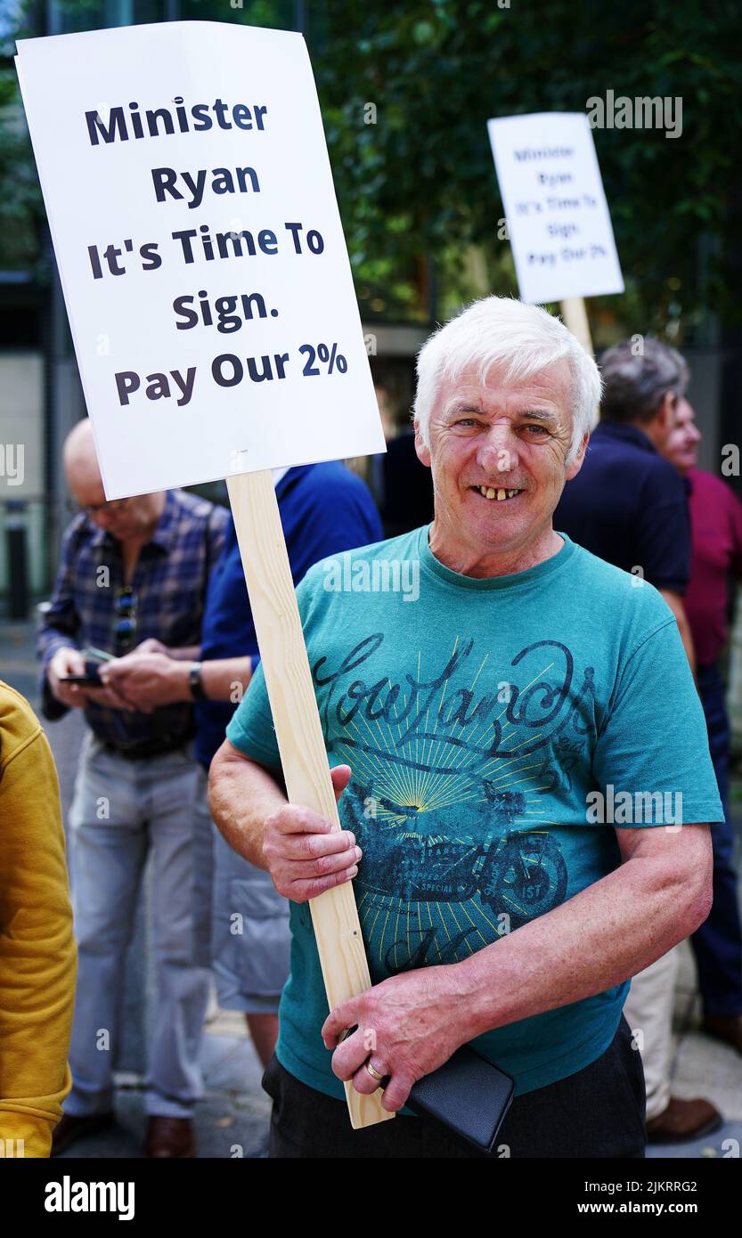 Retired An Post worker Michael Brennan, who worked for the company for 22 years, as An Post pensioners protest outside the Department of the Environment, Climate and Communications, Dublin, to demand that Minister Eamon Ryan immediately signs off on a 2% pay increase. Picture date: Wednesday August 3, 2022. Stock Photo