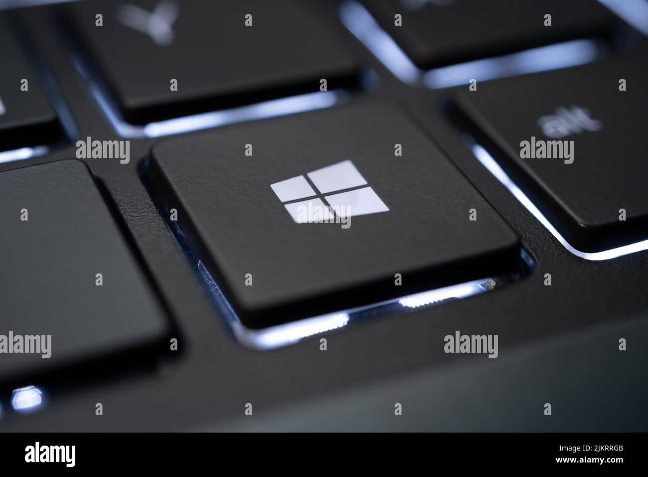 Closeup of the Windows key on an illuminated keyboard Stock Photo