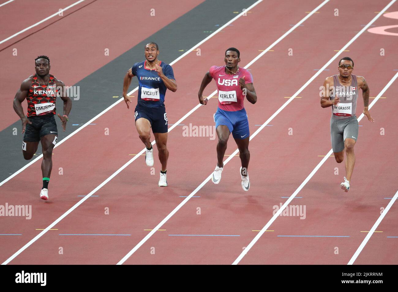 August 01st, 2021 - Tokyo, Japan: Fred Kerley of United States finishes ahead of Andre de Grasse of Canada and Ferdinand Omurwa of Kenya in the Men's Stock Photo