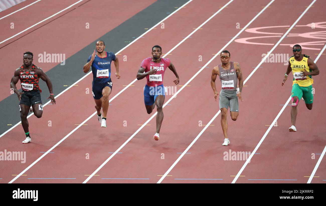 August 01st, 2021 - Tokyo, Japan: Fred Kerley of United States finishes ahead of Andre de Grasse of Canada and Ferdinand Omurwa of Kenya in the Men's Stock Photo