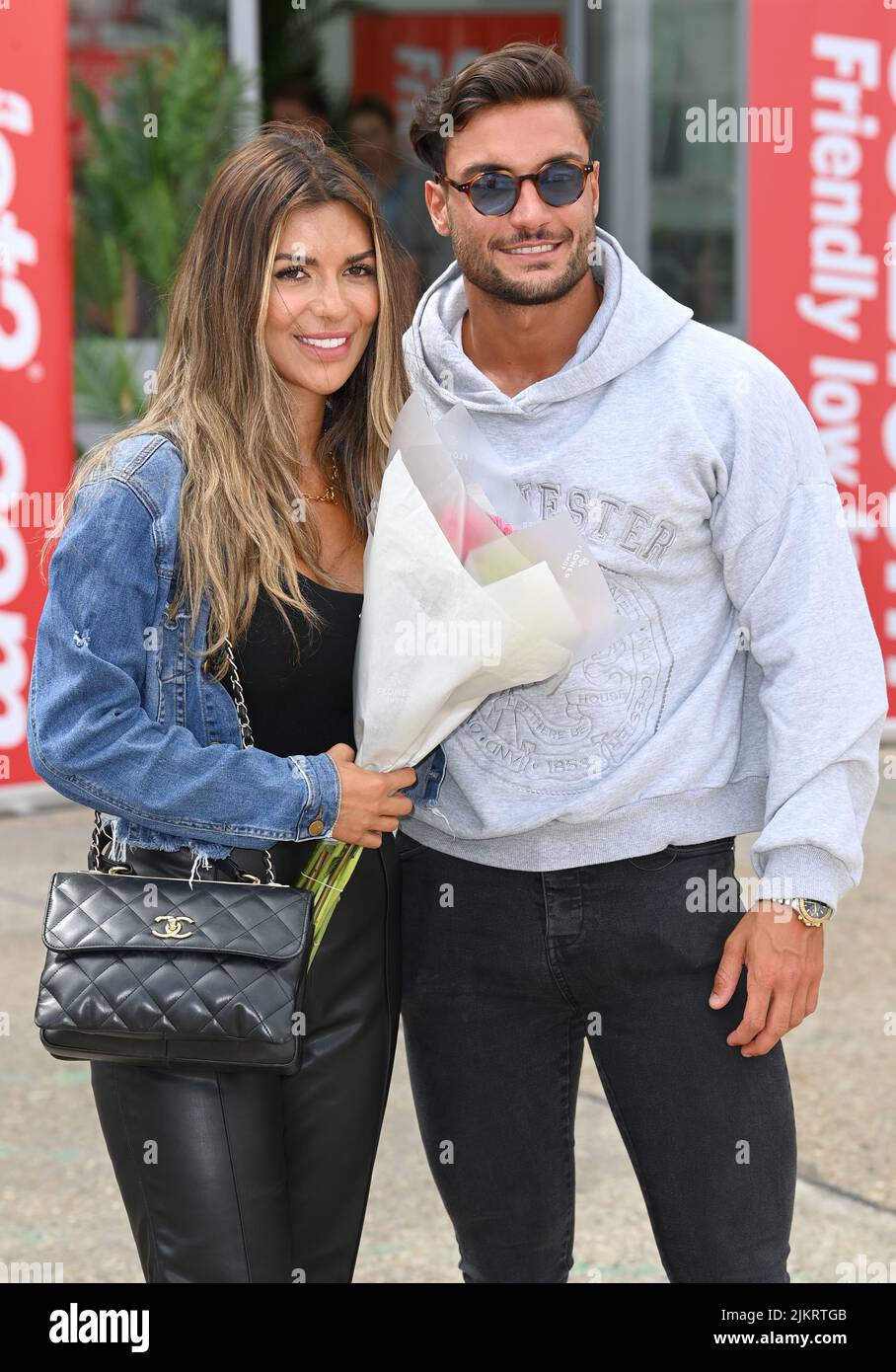Stansted, UK. 03rd Aug, 2022. August 3rd, 2022. London, UK. Ekin-Su Culculoglu and Davide Sanclimenti, winners of Love Island 2022 arriving at Stansted Airport. Credit: Doug Peters/Alamy Live News Stock Photo