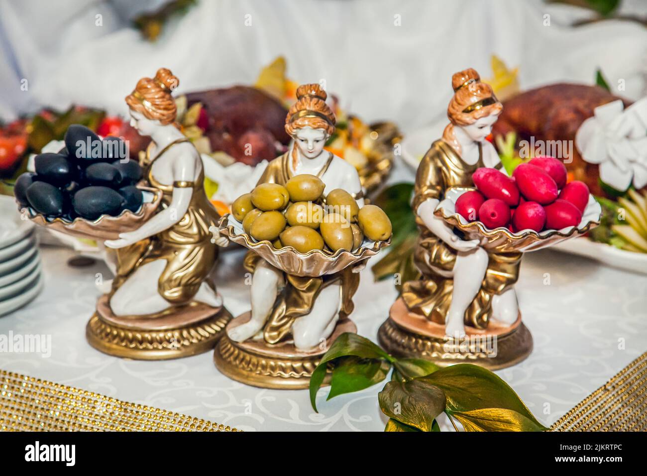 Different olives in buffet table with meat snacks Stock Photo Alamy