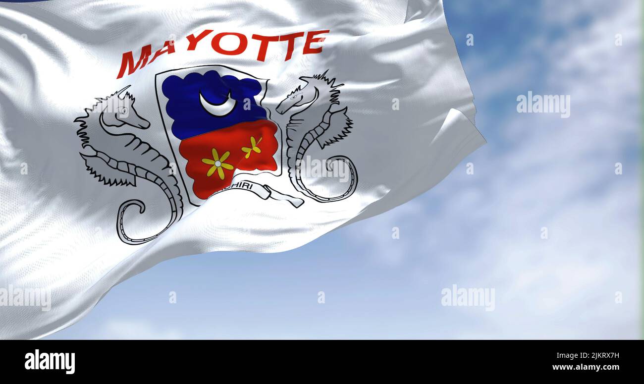 Flag of Mayotte waving in the wind on a clear day. Mayotte is an overseas department and region and single territorial collectivity of France Stock Photo