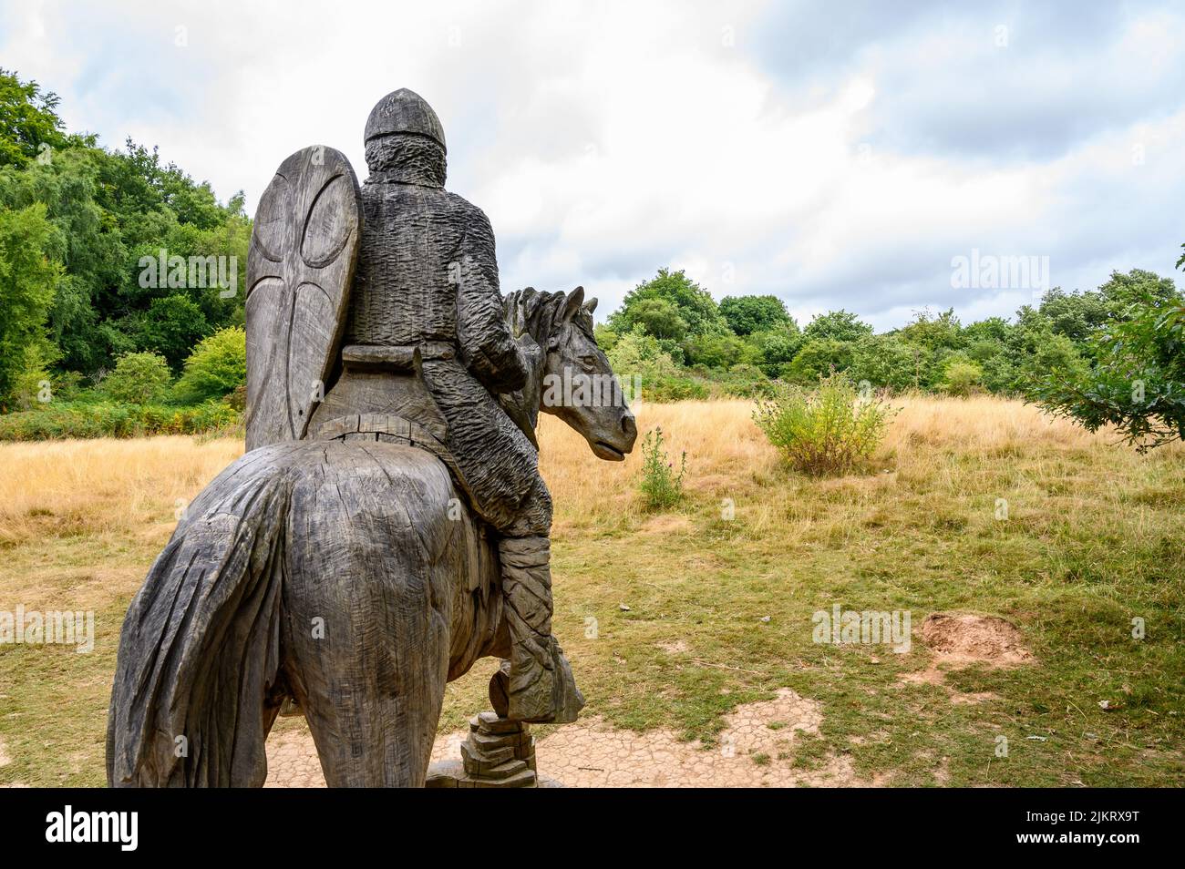 View over the battlefield at the Battle of Hastings in 1066 with a wood sculpture of a Norman warrior, Battle, East Sussex, England. Stock Photo