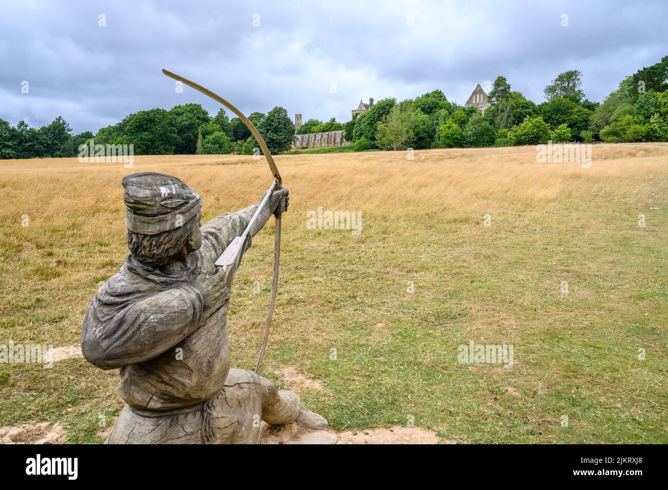 View over the battlefield at the Battle of Hastings in 1066 with a wood sculpture of a Norman warrior, Battle, East Sussex, England. Stock Photo