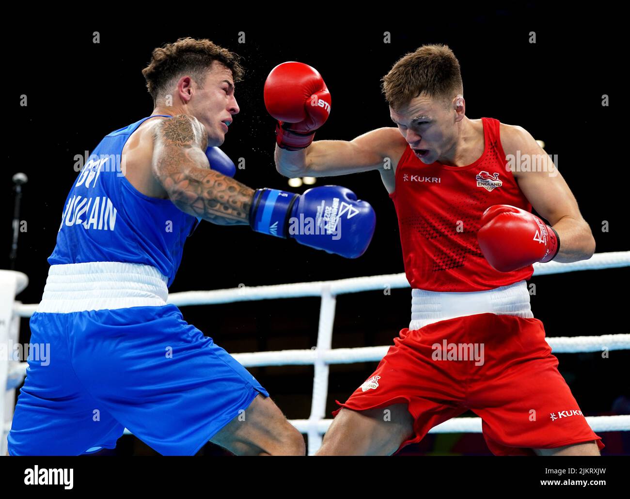 England's Lewis Richardson (right) and Guernsey's Billy le Poullain during the Men's Over 71kg-75kg (Middleweight) - Quarter-Final 1 at The NEC on day six of the 2022 Commonwealth Games in Birmingham. Picture date: Wednesday August 3, 2022. Stock Photo
