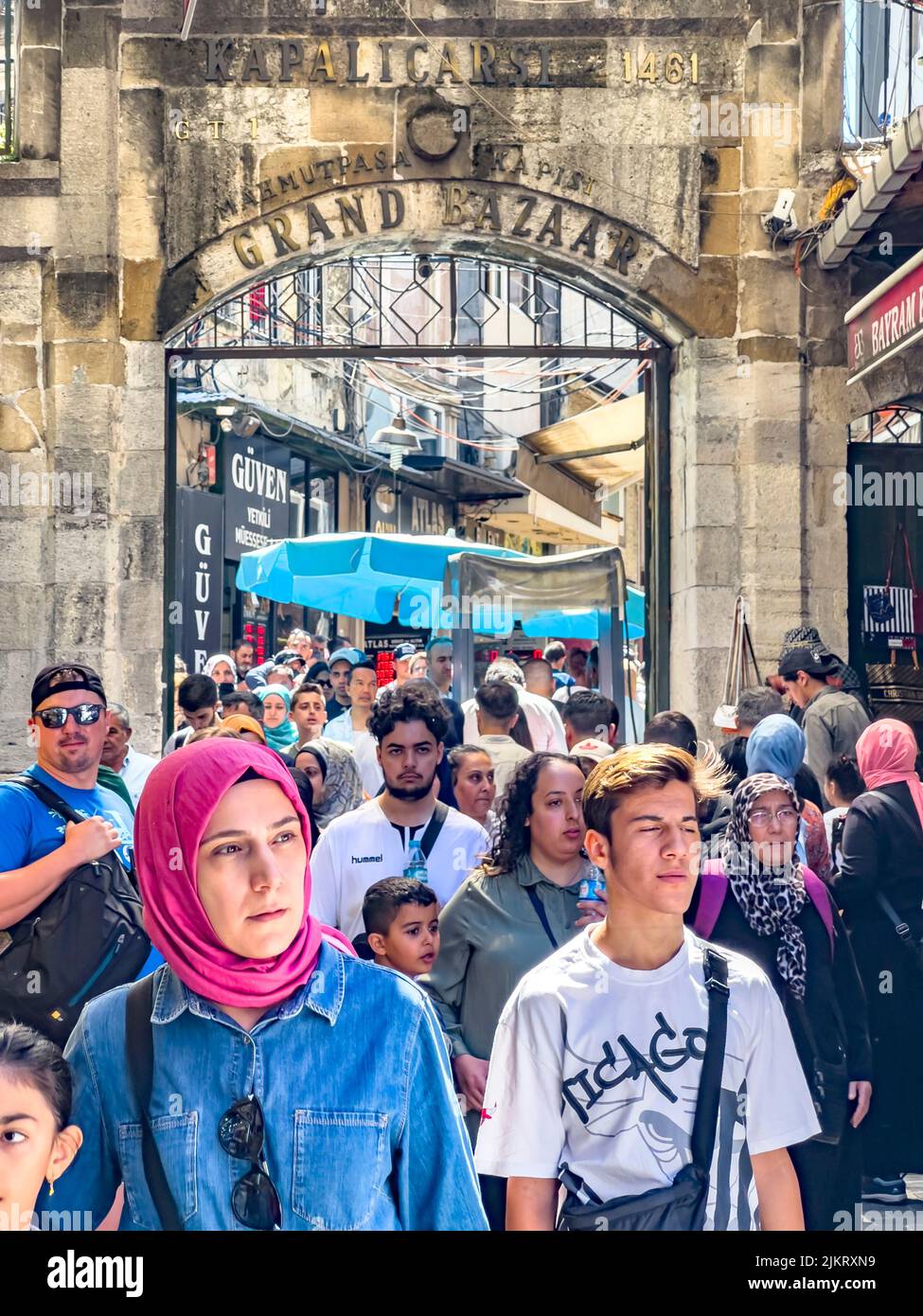 Istanbul, Turkey, 07.14.2022: Grand Bazaar Mahmutpasa Gate Entrance with massive tourist crowds. The largest, oldest covered market in the world. Stock Photo