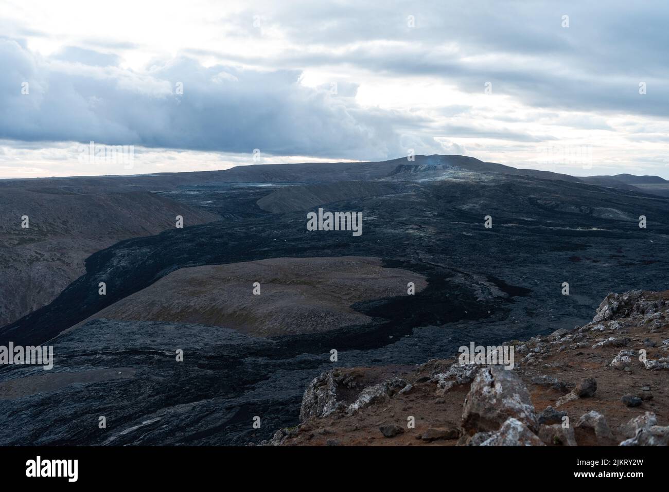 Smoke rising over the Fagradsfjall volcanic area in Reykjanes peninsula