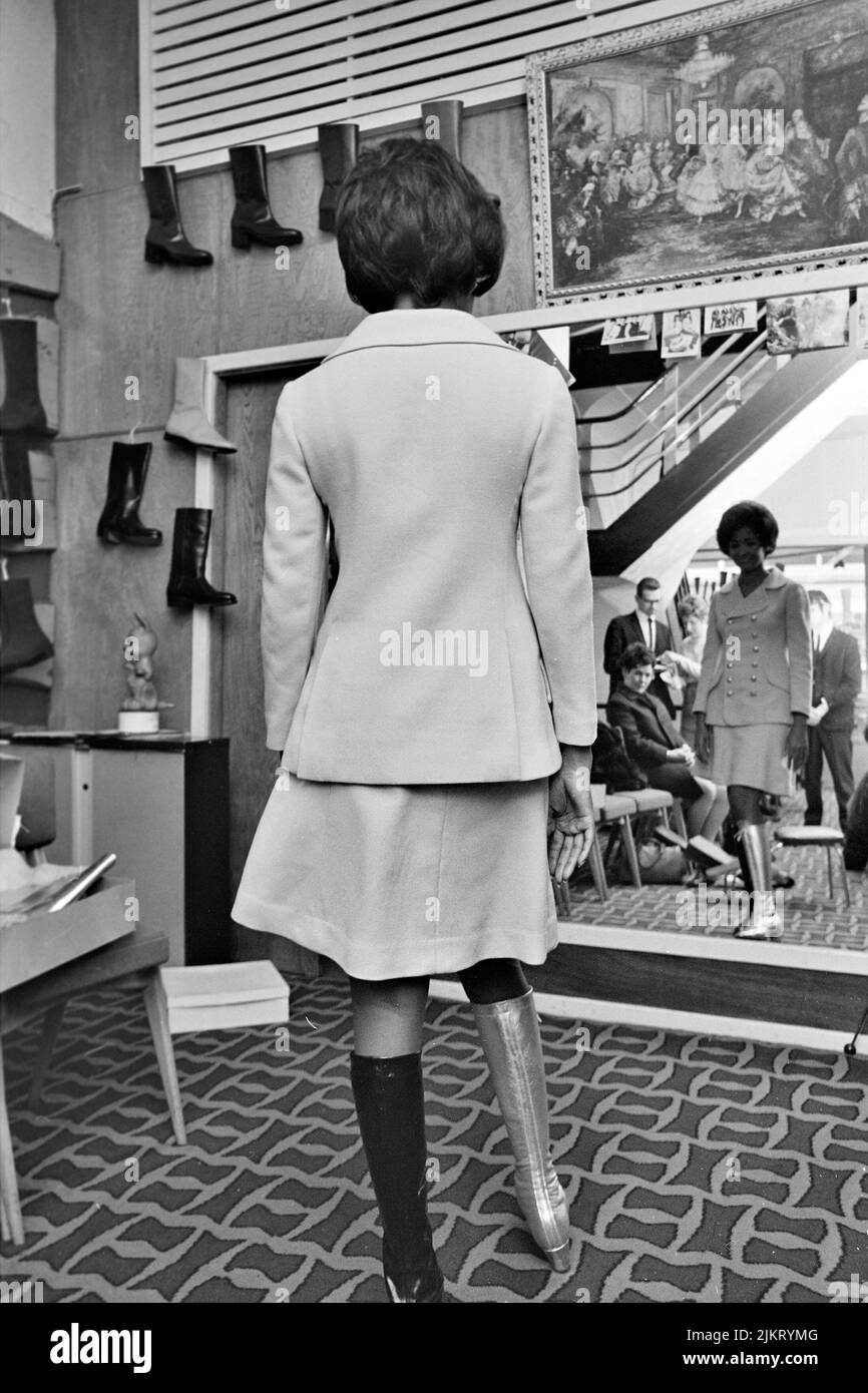 NANCY WILSON (1937-2018) American singer shopping for boots on Oxford Street, London, in March1968. Photo: Tony Gale Stock Photo