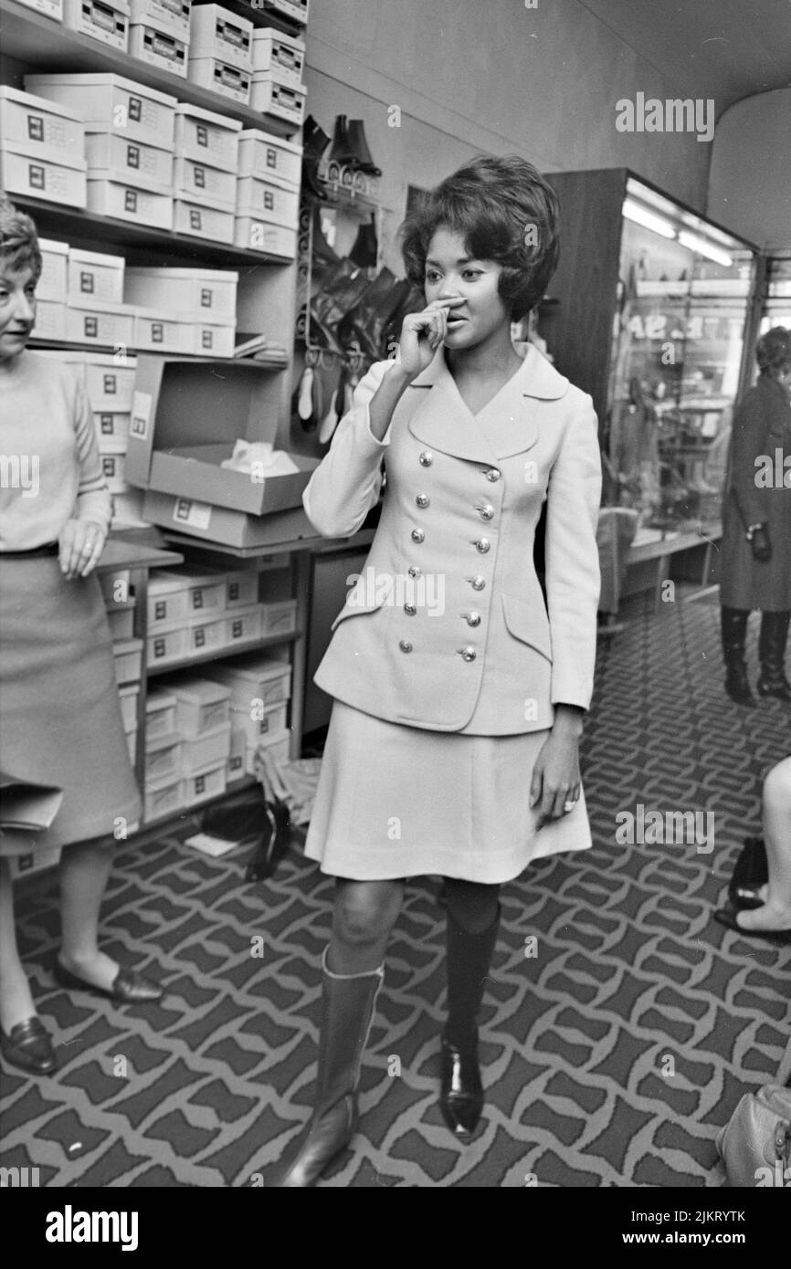 NANCY WILSON (19372018) American singer shopping for boots on Oxford