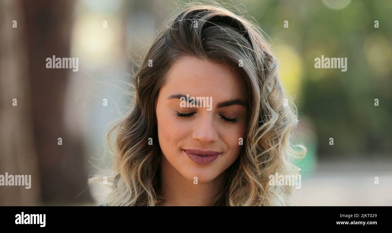 Portrait of young woman with eyes closed Stock Photo - Alamy