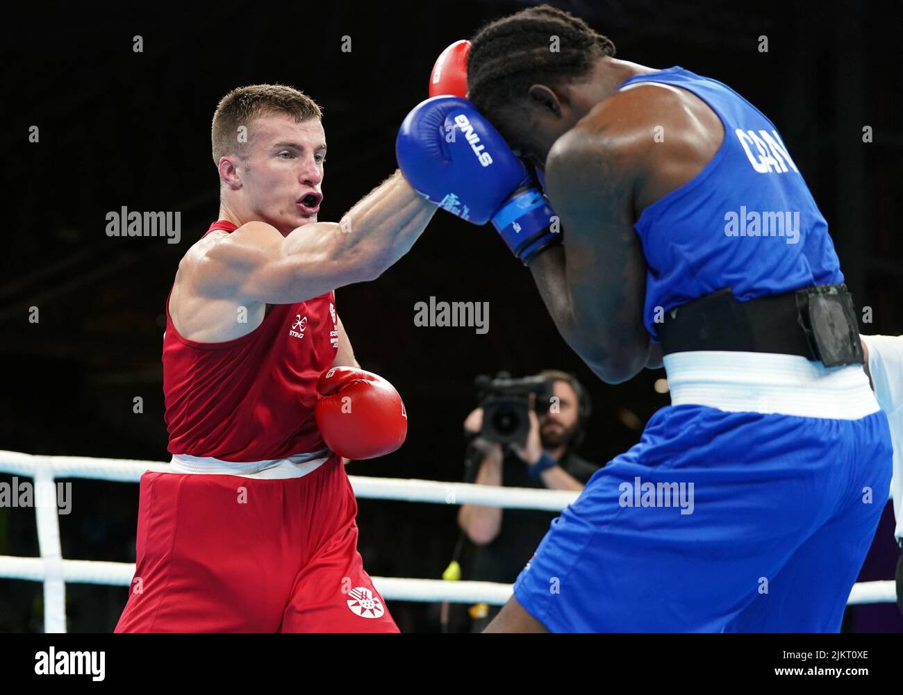 Scotland's Sean Lazzerini on his way to victory over Canada's Keven Beausejour following the Men's Over 75kg-80kg (Light Heavyweight) - Quarter-Final 1 at The NEC on day six of the 2022 Commonwealth Games in Birmingham. Picture date: Wednesday August 3, 2022. Stock Photo